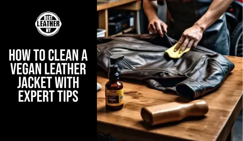 Person carefully cleaning a brown vegan leather jacket on a wooden table using a soft cloth and leather cleaner bottle, representing Best Leather NY’s guide